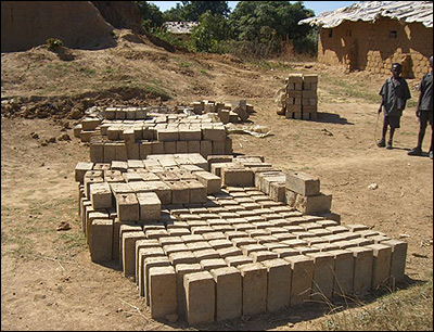 Beginning to stack the bricks.