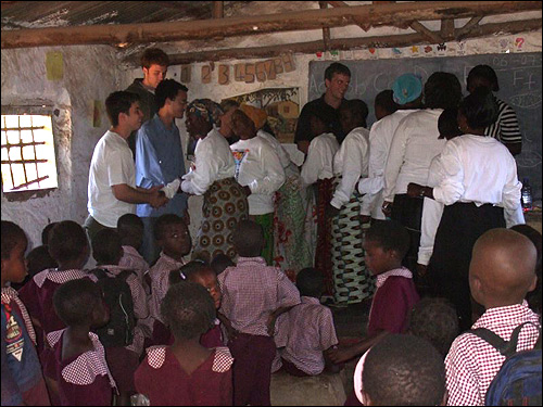 The women greeting us in the school house.