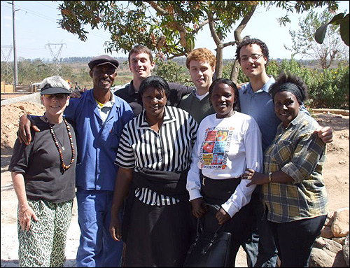 Back, left to right: Cheri, James, Tom, Bryn, Brian. Front: Theresa, Veronica, Gaudencia.