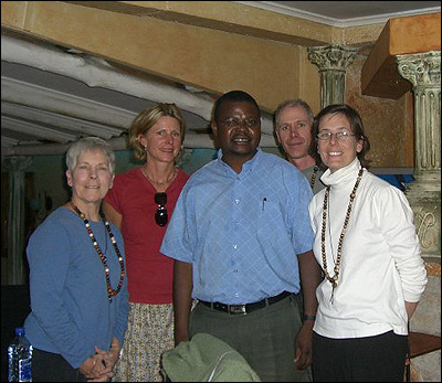 Left to right: Cheri, Tracey, Father Augustine, Dave, Jen