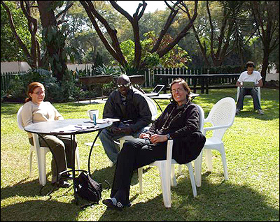 At the guesthouse. Heather, Steve, Jen (Brian in the background working on the computers.)