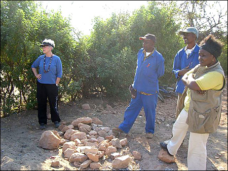 Surveying the property for placement of the water taps.