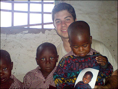 Troy poses with friends.