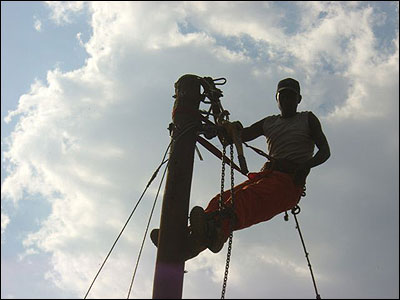 Connecting the wires from the existing ZESCO poles.