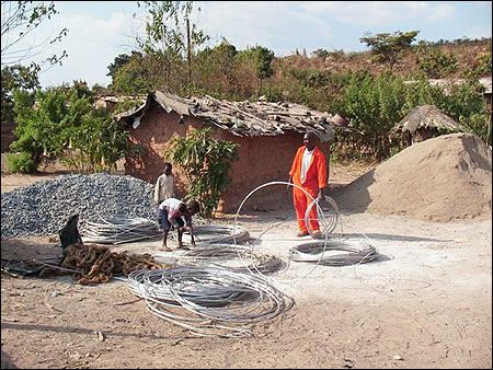 Bringing the wire onto our property.