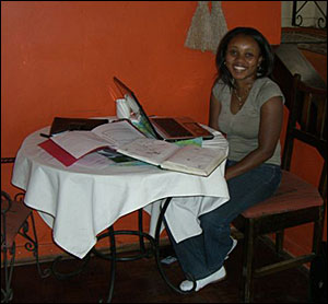 Eunice in the reception area of the guesthouse.