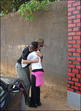 For once we had our camera ready for the reception. Ann and Dave hugging.