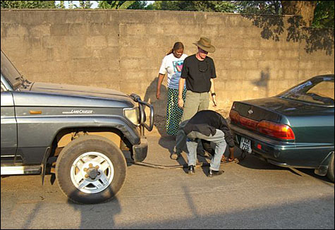 Muyunda attaching the towing bar.