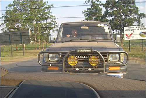 Dave in the car being towed.