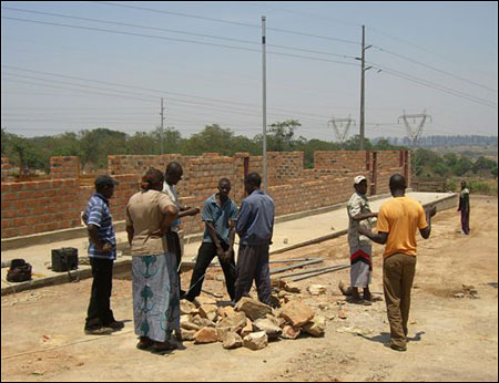 Measuring the depth of the well.