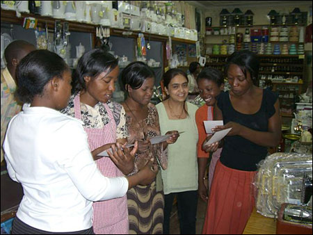 The women admiring their photos.