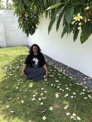 Sreedevi found a quiet spot outside the clinic to take a meditation break.