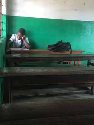 We found Joyce Makina, who is in Grade 8 at the private school, alone in a room at the property after most of the children had left. We asked her what she was doing, and she shared that she has a test tomorrow, and was studying up for it. WOW. 