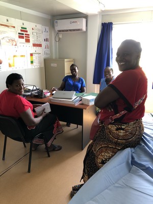 Talking with the nurses. Kayela and Happiness! 