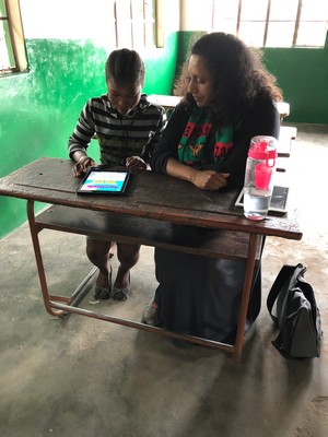 Christine, one of our students, practicing with the spelling app