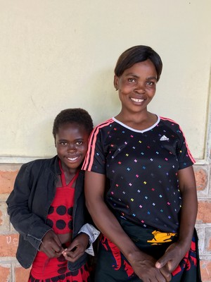 Joyce, one of new grade 5 girls, with her aunt, who was very excited and grateful for the opportunity