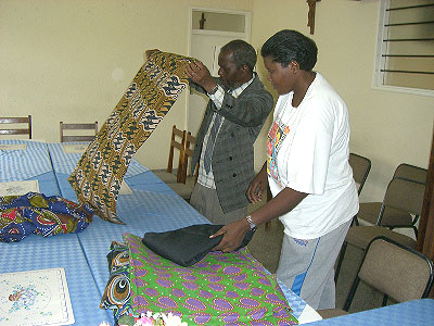 The team laying out chitenge for Martin.